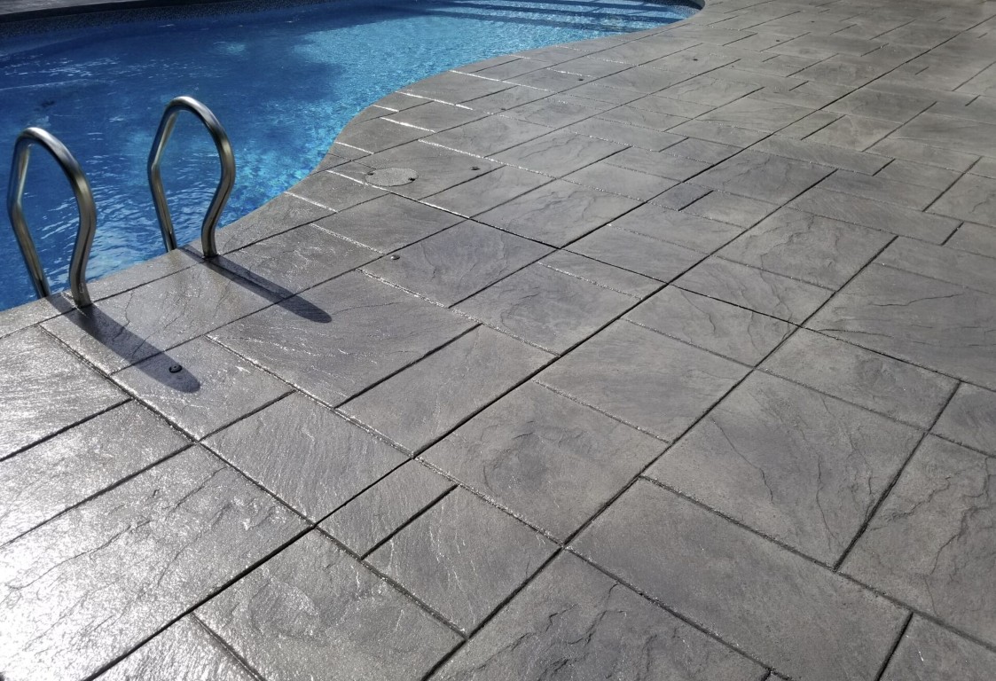 Premium concrete pool deck installation in Lancaster, TX